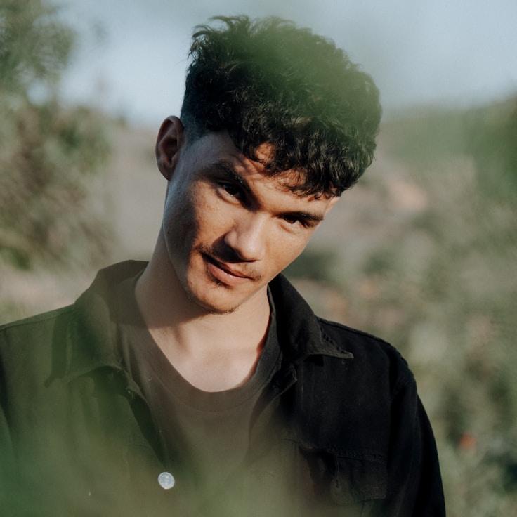 Portrait of Alex Carter, community mentor and Italian cuisine specialist